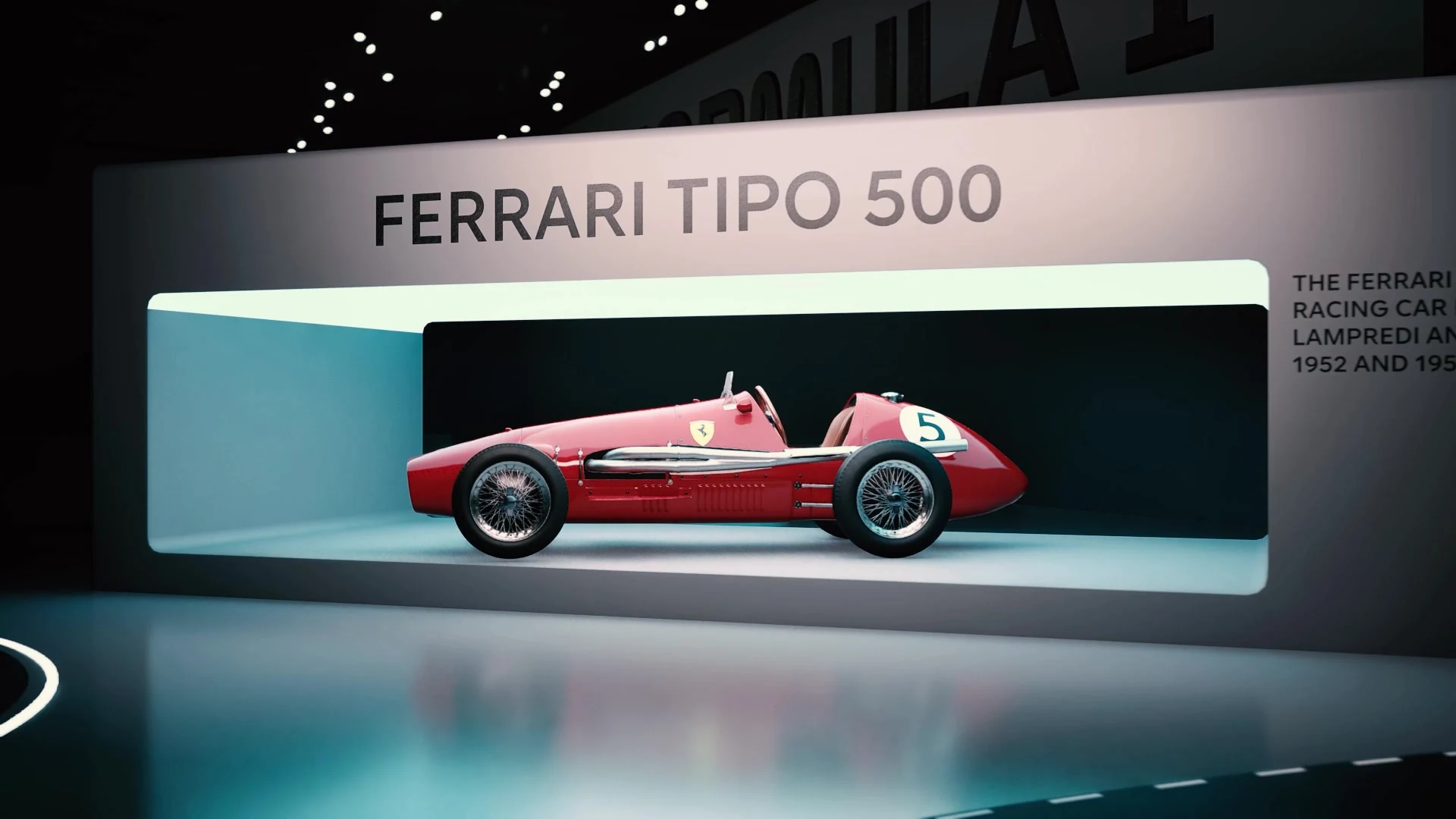 Recessed vehicle display with cool illumination reflected in the showroom floor